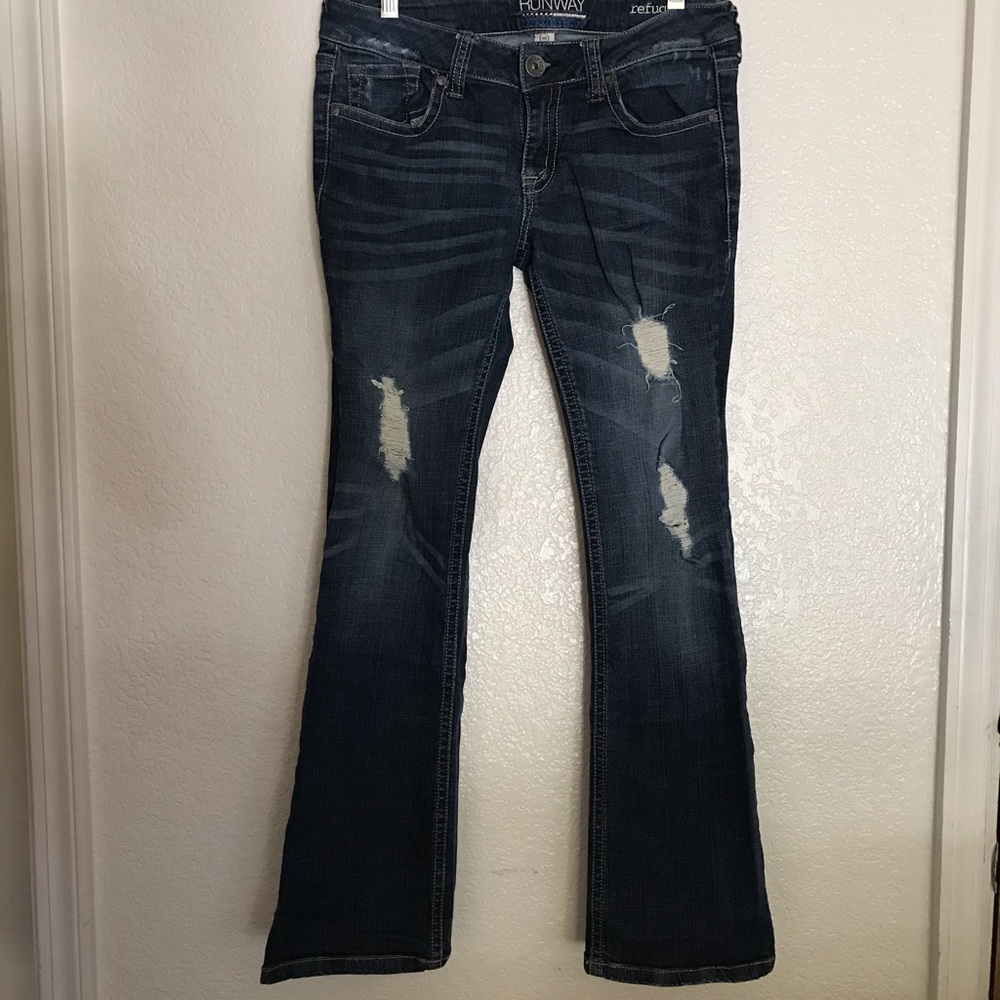 Bell bottom distressed jeans